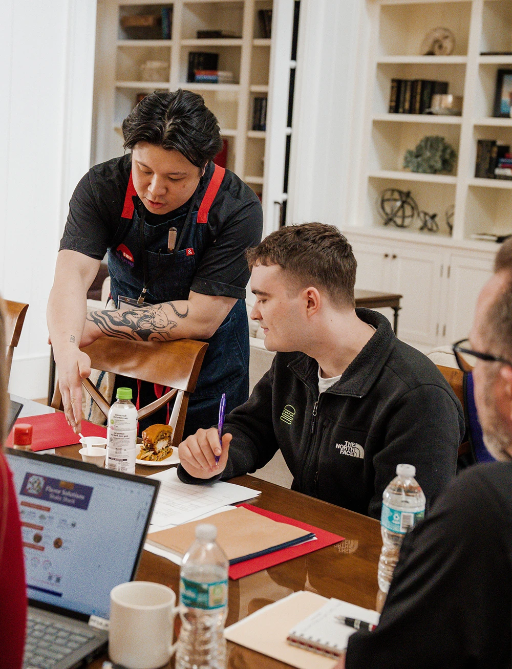 A chef-led exchange meeting in a FoodOvation kitchen