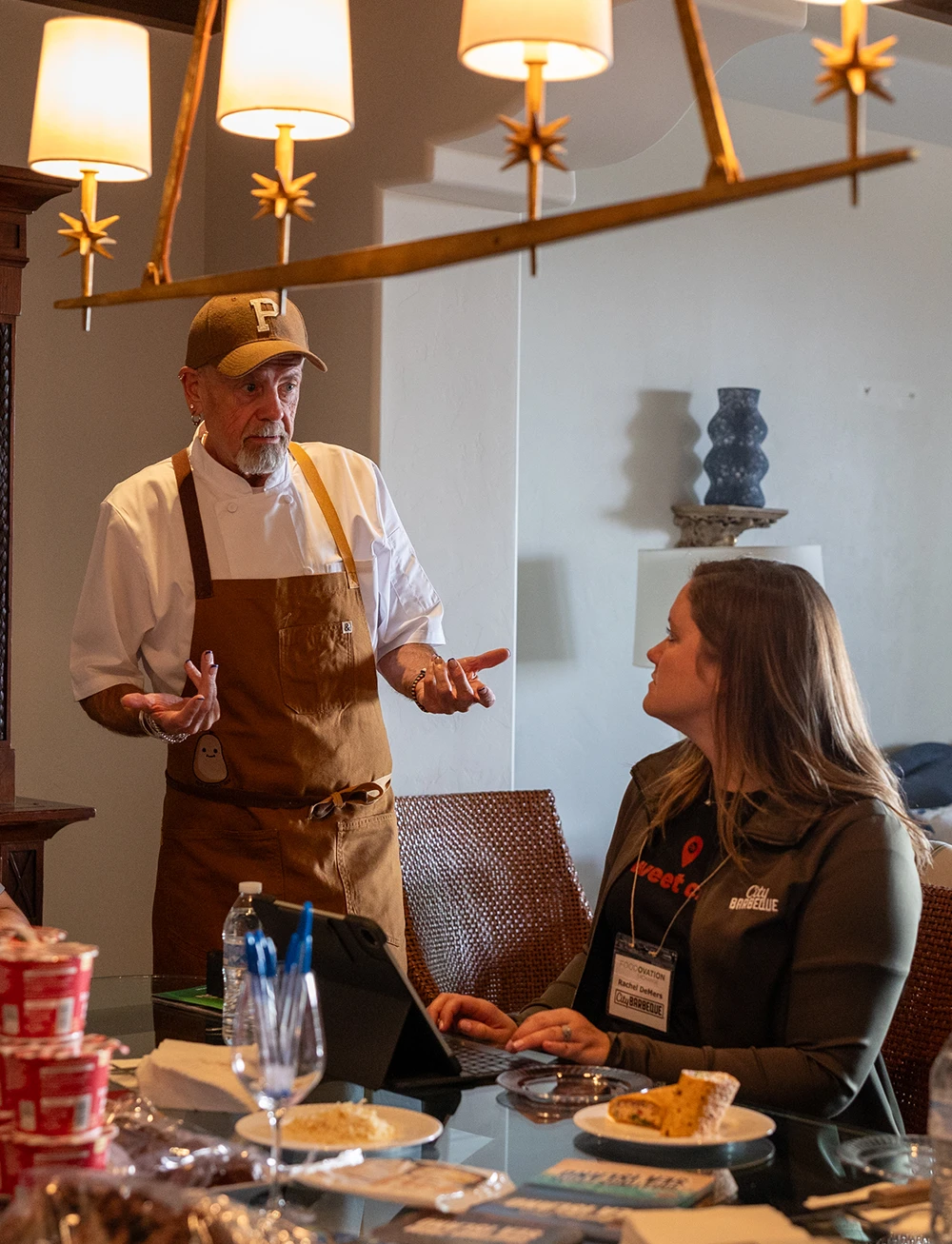 A chef leading a culinary meeting